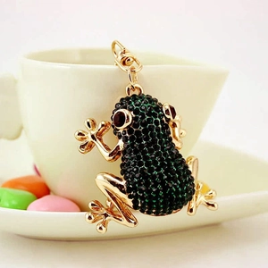 Mignon porte-clés grenouille cartoon doré orné de strass vert émeraude et yeux rouges