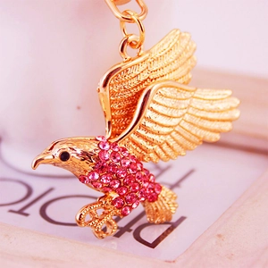 Goldener Adler Schlüsselanhänger mit funkelnden rosa Strasssteinen und Metallhaken
