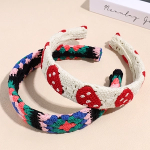 Handmade crochet floral headband set with strawberry and geometric knit patterns