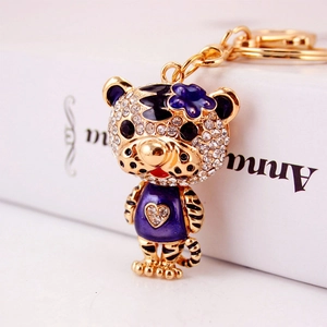 Porte-clés tigre en cristal créatif avec fleur en émail violet pour sacs de femmes