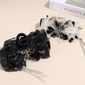 Pinces à cheveux papillon en tissu avec strass étincelants et longues franges