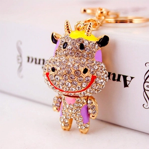 Porte-clés vache en cristal étincelant avec placage en or et détails colorés