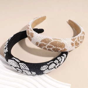 Handcrafted baroque beaded headbands with floral pearl patterns on soft sponge velvet