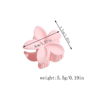 Pince à cheveux fleur rose mat montrant les dimensions en centimètres et en pouces
