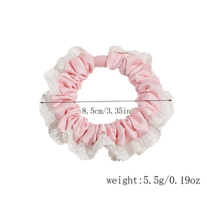 Pink satin hair scrunchie with white lace trim, measuring 8.5cm and weighing 5.5g