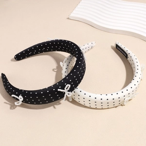 Retro polka dot wide headband with handmade pearl bow decorations in black and white