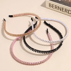 Set of four thin crystal beaded headbands in pink black white and gold colors
