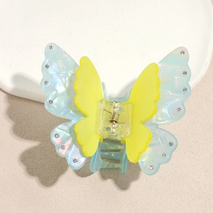 Pince à cheveux papillon double couche avec fini bleu iridescent et strass brillants