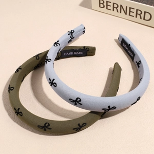 Army green and light blue sponge headbands with butterfly print for high volume look