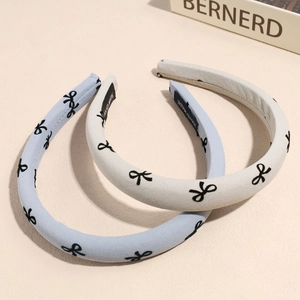 French retro style thick sponge headband set with black bow patterns in blue and white