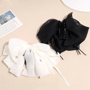 Pinces à cheveux à gros nœud en organza noir et blanc avec un design élégant de requin