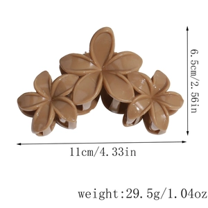 Tableau des tailles pour pince à cheveux fleur marron montrant 11cm de large et 6,5cm de haut