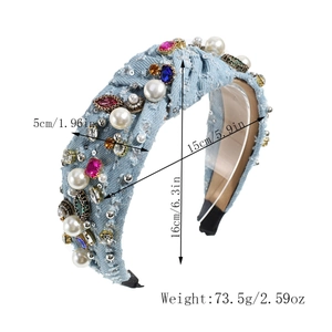 Detailed dimensions of denim knotted headband with pearls and rhinestones on white backdrop