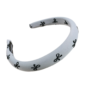 Padded French headband with sponge thickness and vintage black bow patterns in light gray
