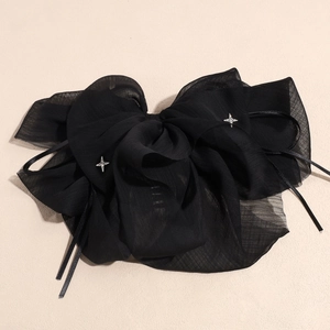 Pince à cheveux élégante avec grand nœud en mousseline noire et strass en étoile argent