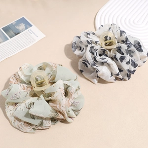 Large mesh bow hair claws in butterfly print and floral chiffon fabric patterns