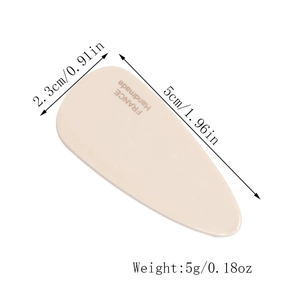 Detailed view of handmade cream acetate hair clip with specific dimensions 5cm x 2.3cm
