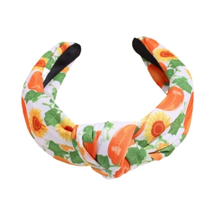 Knotted wide headband with vibrant sunflower and pumpkin patterns for autumn style