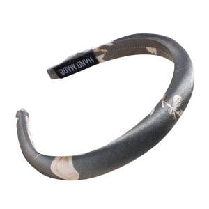 Elegant grey satin padded headband with cream floral pattern and thick sponge design