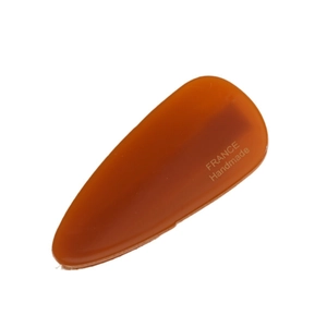 Amber acetate teardrop hair clip with gold France Handmade lettering on white background