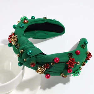 Cerchietto natalizio verde con nodo, perle festive, strass e perline dorate