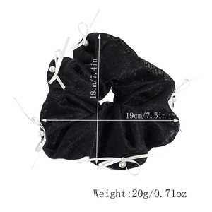Macro shot of 18cm black lace hair scrunchie with white bows and central pearls