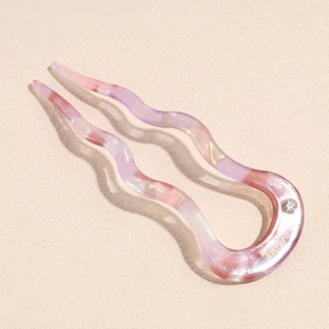 Detail of pink marble U-shaped hair pin with rhinestones and handmade engraving