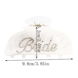 Vista dettagliata della pinza per capelli perlata da 9,8cm con scritte Bride in strass