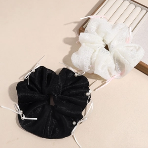 Elegant oversized ribbon bow scrunchies with faux pearls in black and white lace style