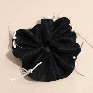 Elegant black fabric scrunchie with white ribbon bows and pearls for women's hair styling