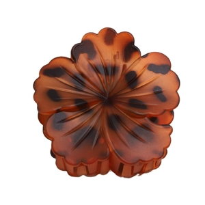 Elegant amber leopard pattern flower hair claw clip with a glossy finish for hair styling