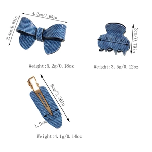 Three-piece denim blue hair clip set with bow and claw clip detailing dimensions