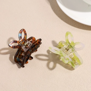 Set of two butterfly hair claws in tortoiseshell and translucent jelly green styles