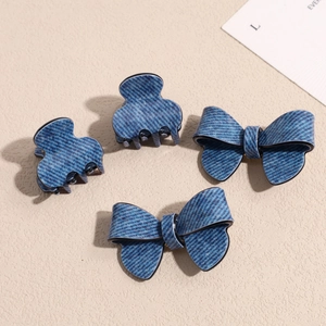 4-piece set of denim blue hair clips featuring bow designs and matte claws for women