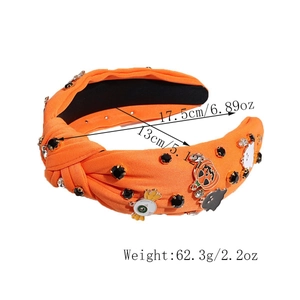 Détail du serre-tête orange Halloween avec citrouilles, fantômes et strass brillants