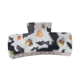 Large square Halloween hair claw clip featuring spooky pumpkin, bat, and skull patterns