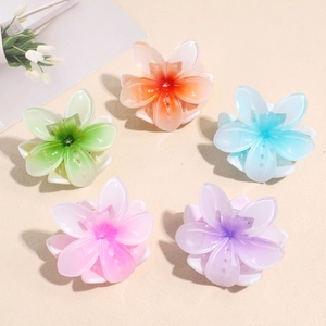 Set of five floral hair claws in gradient jelly colors including pink and green