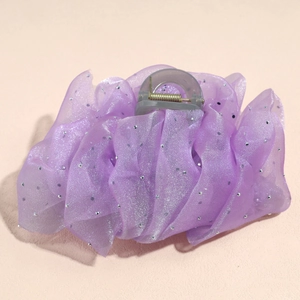 Detail of purple organza hair claw clip with pleated mesh and sparkling silver rhinestones