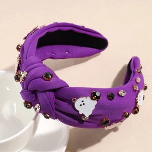 Détail du serre-tête d'Halloween violet noué avec strass et petits fantômes blancs