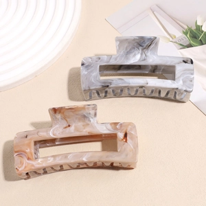 Large geometric marble and amber textured hair claws for elegant updo hairstyles