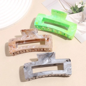 Large marble pattern nonslip hair claw clips in green, brown, and grey color options