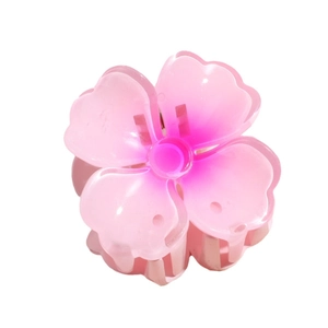 Pince à cheveux fleur de cerisier rose dégradé avec design minimaliste en résine