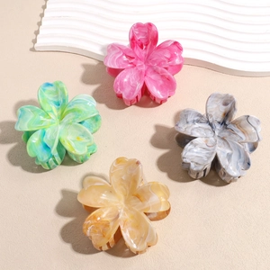 Set of four gradient acetate flower hair claws in pink, green, gray and orange colors