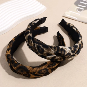Set of two stylish leopard print braided headbands with a wide vintage bohemian design