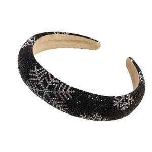 Padded rhinestone headband with sparkling silver snowflake patterns on black fabric