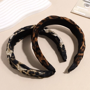 Chic leopard print plush padded headband set with braided design for winter styling