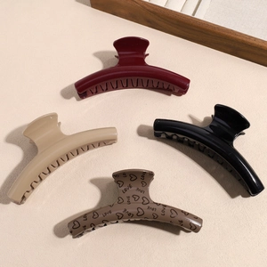 Elegant 4-pack large resin shark hair claws in burgundy, khaki, black and heart patterns