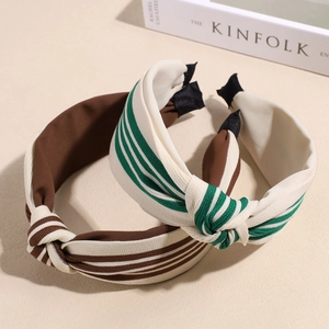 Elegant striped knotted headbands in brown and beige with stylish twill texture
