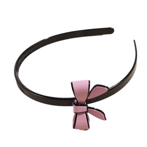 Pink and black bow headband with non-slip teeth for women's stylish hair accessory