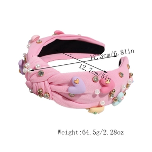 Detailed size chart of pink headband with colorful hearts, pearls and crystals